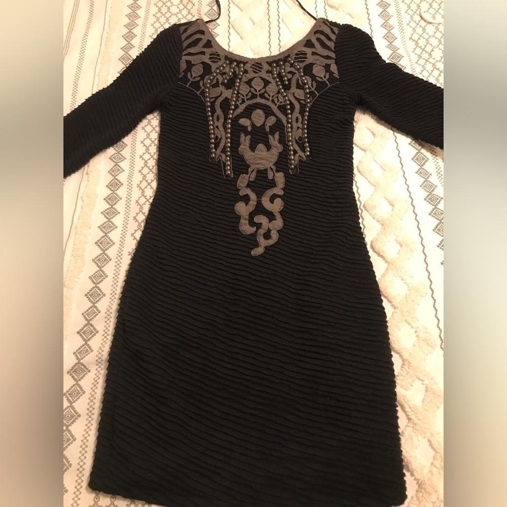 Free People dress in excellent condition, worn 1 time. Well maintained
